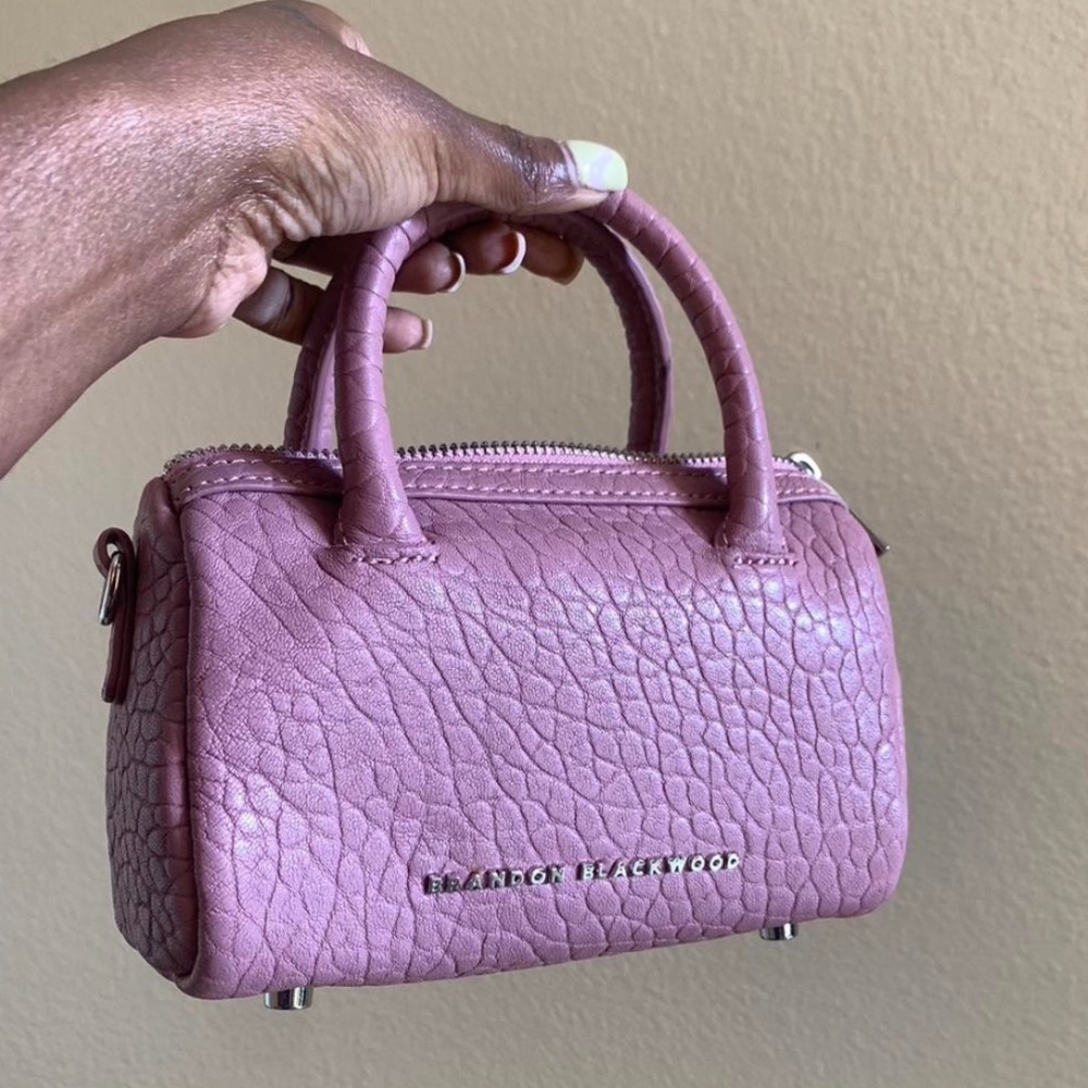 Brandon blackwood mini cara powder pink duffel bag